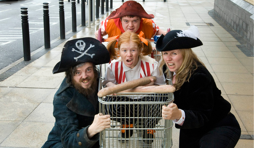 Picture of 4 people dressed as pirates with a shopping trolley