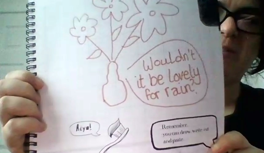 a page from the doodle book with a drawing of flowers in a vase with the phrase wouldn't it be lovely for rain written next to them.