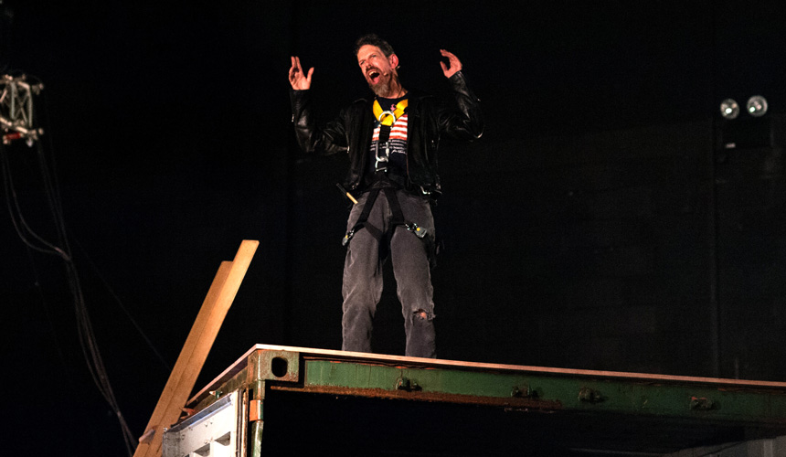 Jez Colborne on top of a shipping container